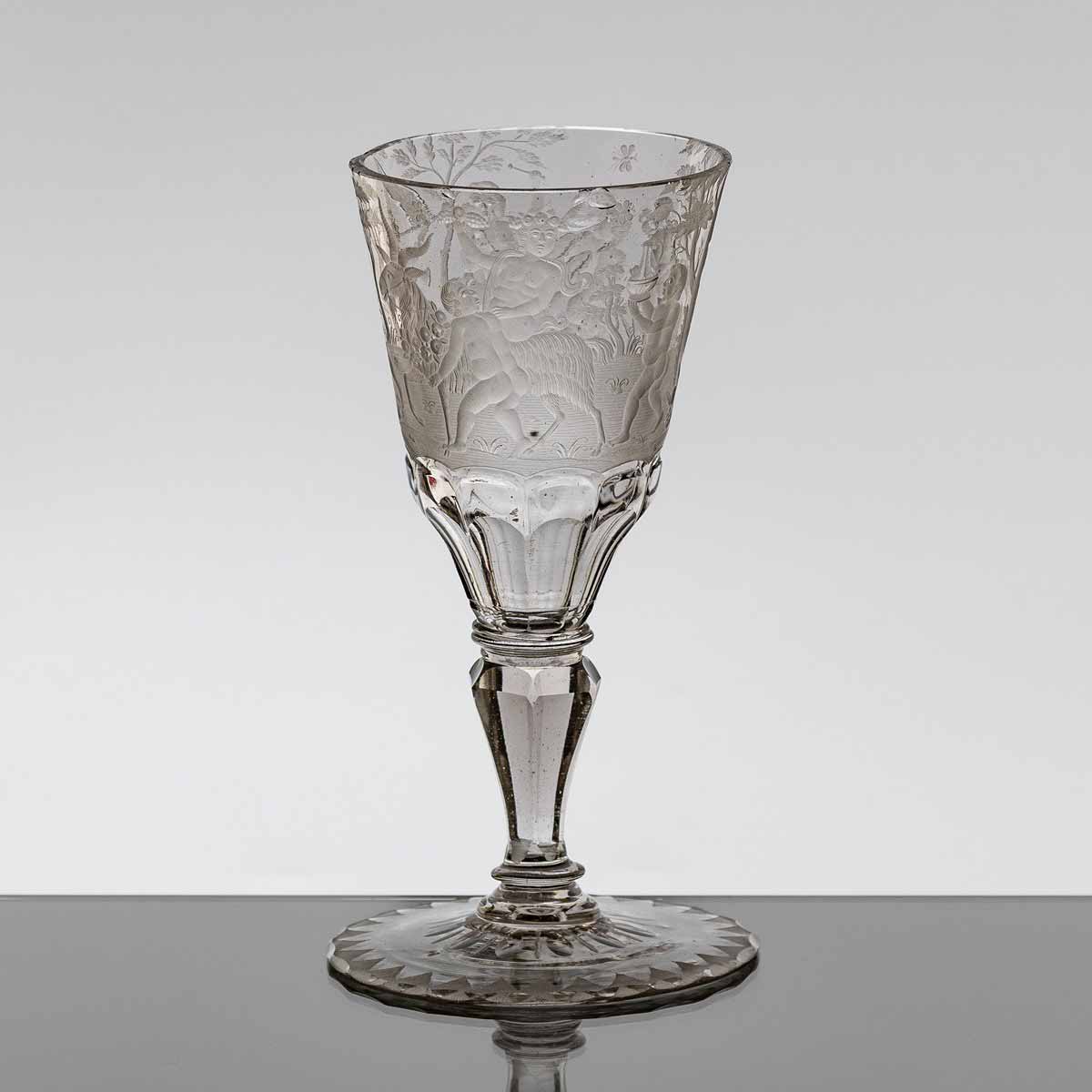 Barokní rytý pohár "Bakchanálie"