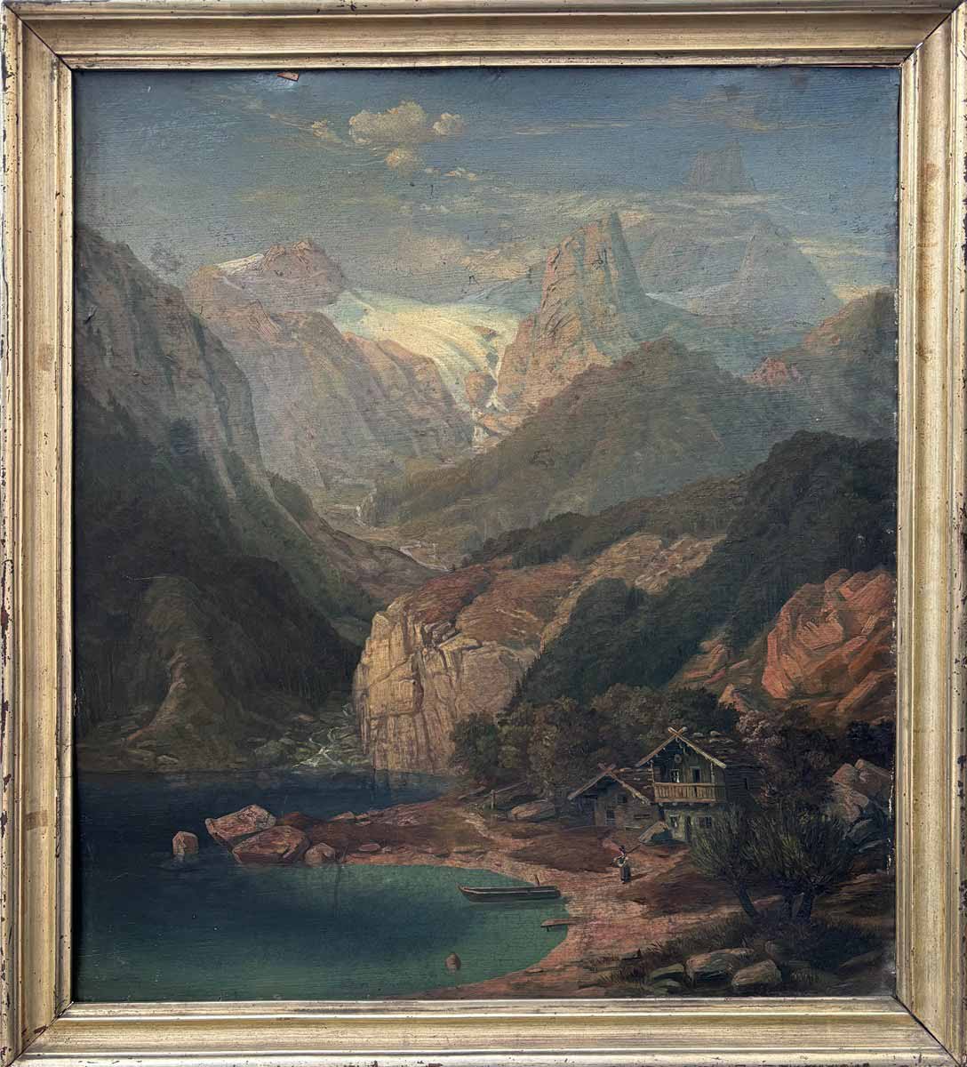 Alpská krajina s jezerem a stavením